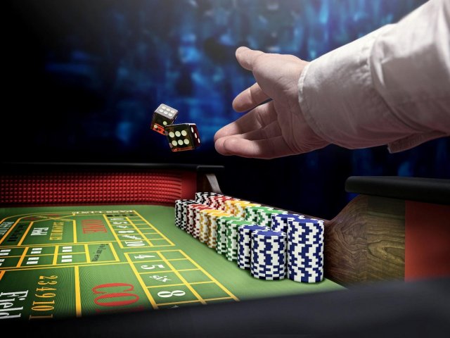 Throwing dice on a craps table