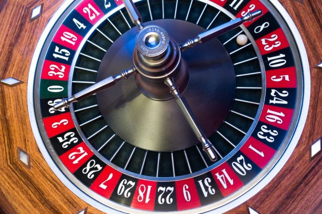 Roulette wheel turning with ball 